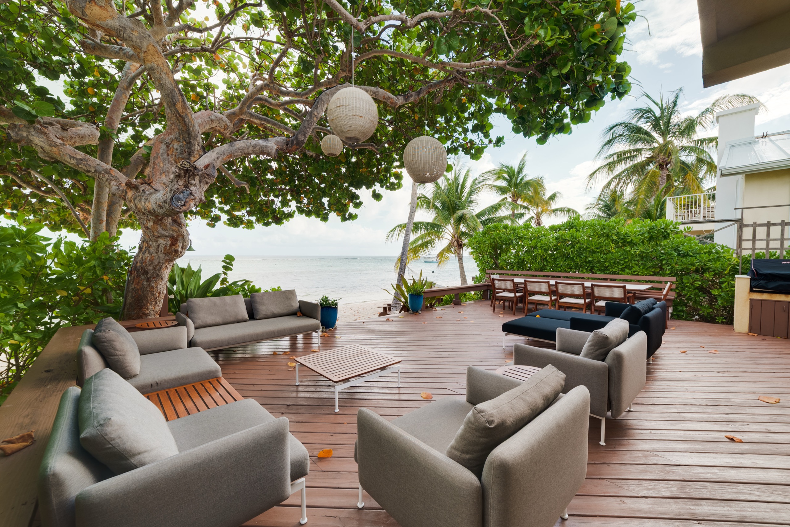Oceanfront patio deck opening onto the Caribbean Sea